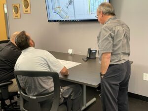 Storage Solutions engineers designing a racking system