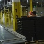 Warehouse worker with heat exhaustion